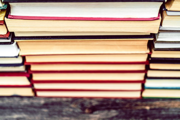 Rows of books in the library. Background for text. Symbol of knowledge and learning.