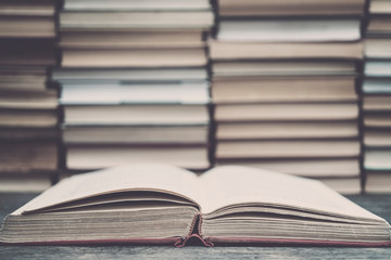 Old book in the red obnozhka. Symbol of knowledge and learning.