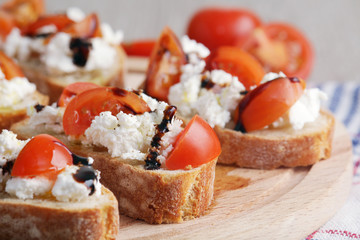 Sandwiches with tomatoes, homemade cheese, olive oil and balsamic sauce	