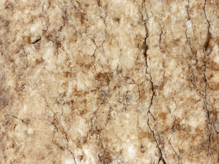 Typical detail of an ancient Italian house wall, made of hand-carved river stones.