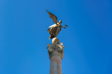 Angels of Rome. Vittoriano or Altare della Patria. Winged Victory on the top of a column. Rome, UNESCO world heritage site, Italy.