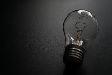 light bulb on black background