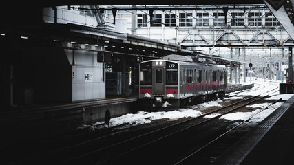Akita,Japan, 31 January  2018:Local train on a snowy train station in winter