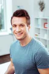 Portrait of a happy handsome young man