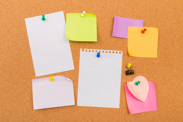 Cork board with pinned colored blank notes - Image .