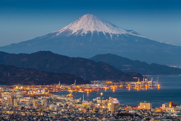 Mt.Fuji in winter and evening lights of Shimizu city and Shimizu port