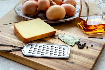 Fresh golden onion in white plate