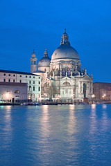 Fototapeta na wymiar Illuminated basilica Santa Maria della Salute in Venice, Italy