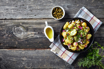 new potato salad with red onion, capers, greens