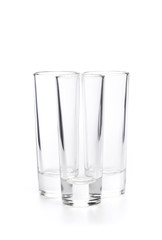  small empty glasses on a white background