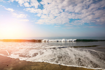 Summer background of ocean and beach with blue sky. Free space for your decoration. 