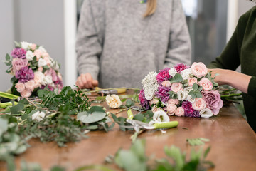 education in the school of floristry. Master class on making bouquets. Summer bouquet. Learning flower arranging, making beautiful bouquets with your own hands. Flowers delivery