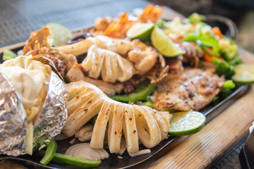 A plate of seafood in a restaurant