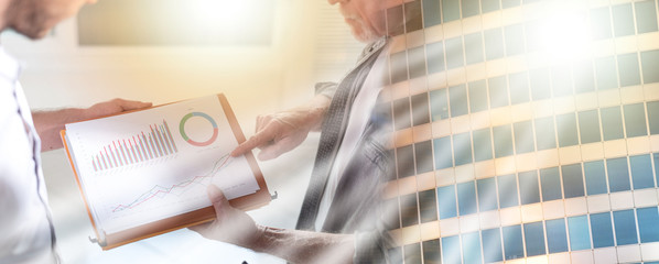 Business people discussing about financial results, light effect