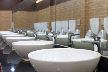 Interior of bathroom with sink basin faucet. Modern design.