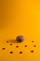 macaroon arranged in beautiful composition on a  yellow background