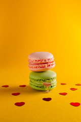 macaroon arranged in beautiful composition on a  yellow background