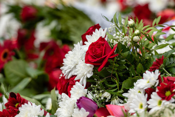 Irregularly placed flowers in various colors, Multi colored floral background - Image