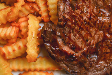 Steak and chips, tasty ribeye steak served with fries