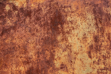 Rusty metal wall background. Corrosion of iron with streaks of rust. Rust stains on the metal surface. Rusty corrosion.	