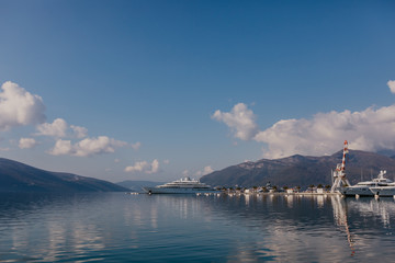 Tivat, Montenegro - 09.11.2018. Embankment of Tivat city, Montenegro, in a sunny summer day. The beginning of the cruise on the Bay of Kotor.