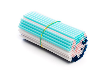 Set of colored straws for drinking cocktails on a white background. Isolated