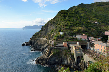 Riomaggiore - Village of Cinque Terre National Park at Coast of Italy. Beautiful colors at sunset. Province of La Spezia, Liguria, in the north of Italy - Travel destination and attractions in Europe.