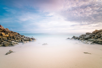 Fototapeta na wymiar long exposures sand beach sea in twilight