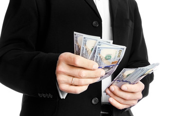 Business man holding money on white background