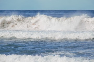 Naklejka na ściany i meble Massive white wave and deep blue water. This offers the Australian ocean 