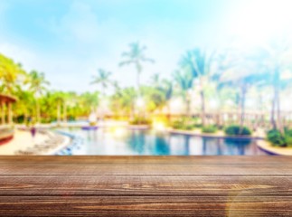 Pool to the Beach with Palms on background