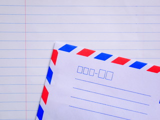 Fototapeta na wymiar envelope notebook and pen on white background