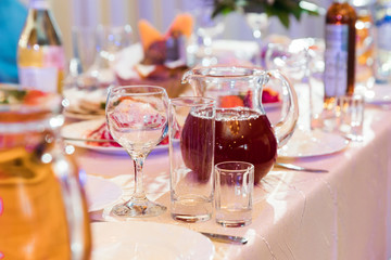 Flower table decorations for holidays and wedding dinner. Table set for holiday, event, party or wedding reception in restaurant