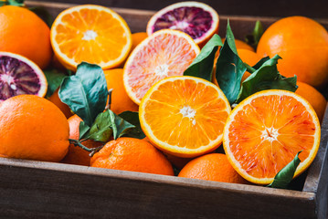 Oranges citrus fruits background.Fresh juicy oranges vitamin C. - obrazy, fototapety, plakaty