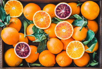 Oranges citrus fruits background.Red and white oranges.