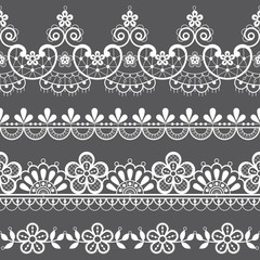 Fototapeta premium Vintage lace seamless vector pattern, ornamental repetitive design with flowers and swirls in white on gray background