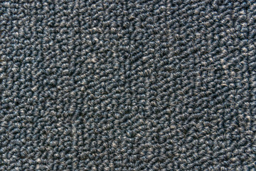 Synthetic fiber carpet
