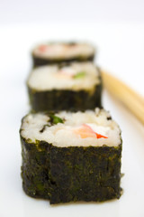 Japanese cuisine, rice sushi and fish - closeup
