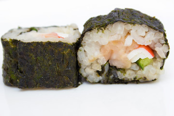 Japanese cuisine, rice sushi and fish - closeup