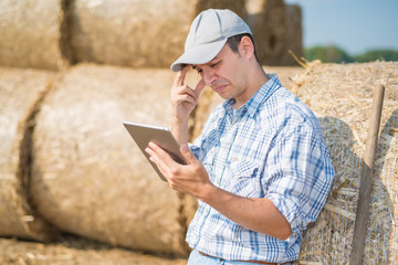 Farmer using his tablet