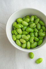 Edamame beans on bowl on a table