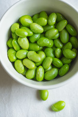 Edamame beans on bowl on a table