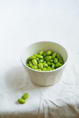Edamame beans on bowl on a table