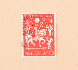 THE NETHERLANDS 1960: A stamp printed in the Netherlands shows the dutch holiday of Sinterklaas, circa 1960