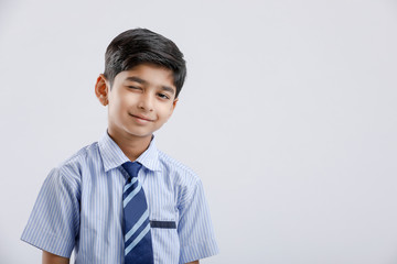 Cute little indian Indian / Asian school boy wearing uniform