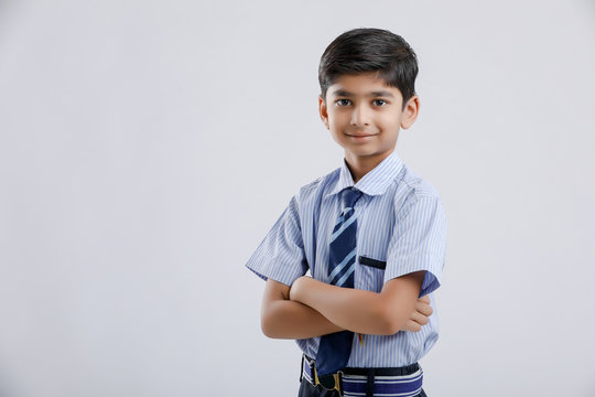 Cute little indian Indian / Asian school boy wearing uniform