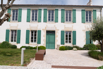 isle ile de Re France picturesque village center white house and green shutter