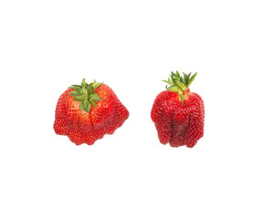 Imperfect  strawberry isolated on white background. Ugly food.