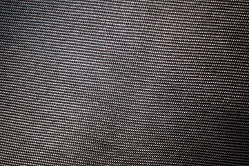 Rough carbon cloth texture.