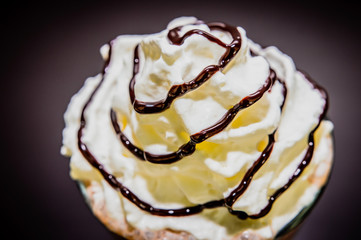 Tasty Detail On Whipped Cream And Chocolate Topping is Circles With Reflection